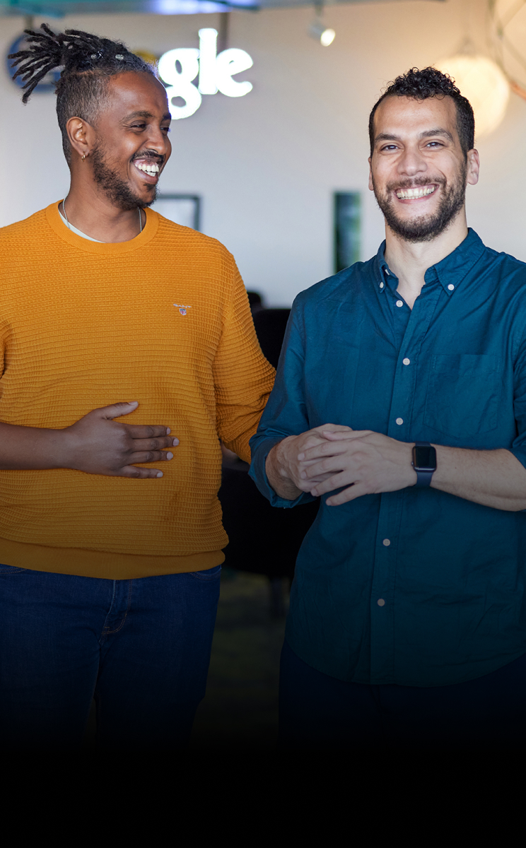 Mohamed Hassan, Co-founder & CTO of Blok-Z with two other people.