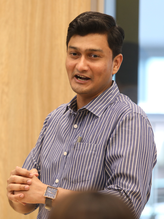 A man holding his hands.