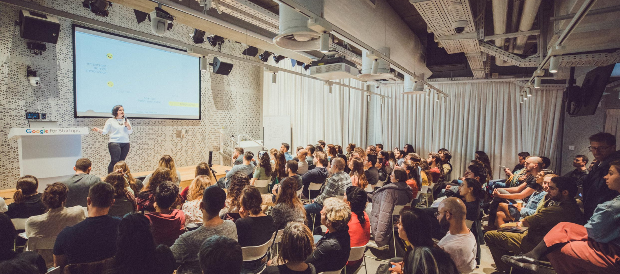 A lady is giving presentation.