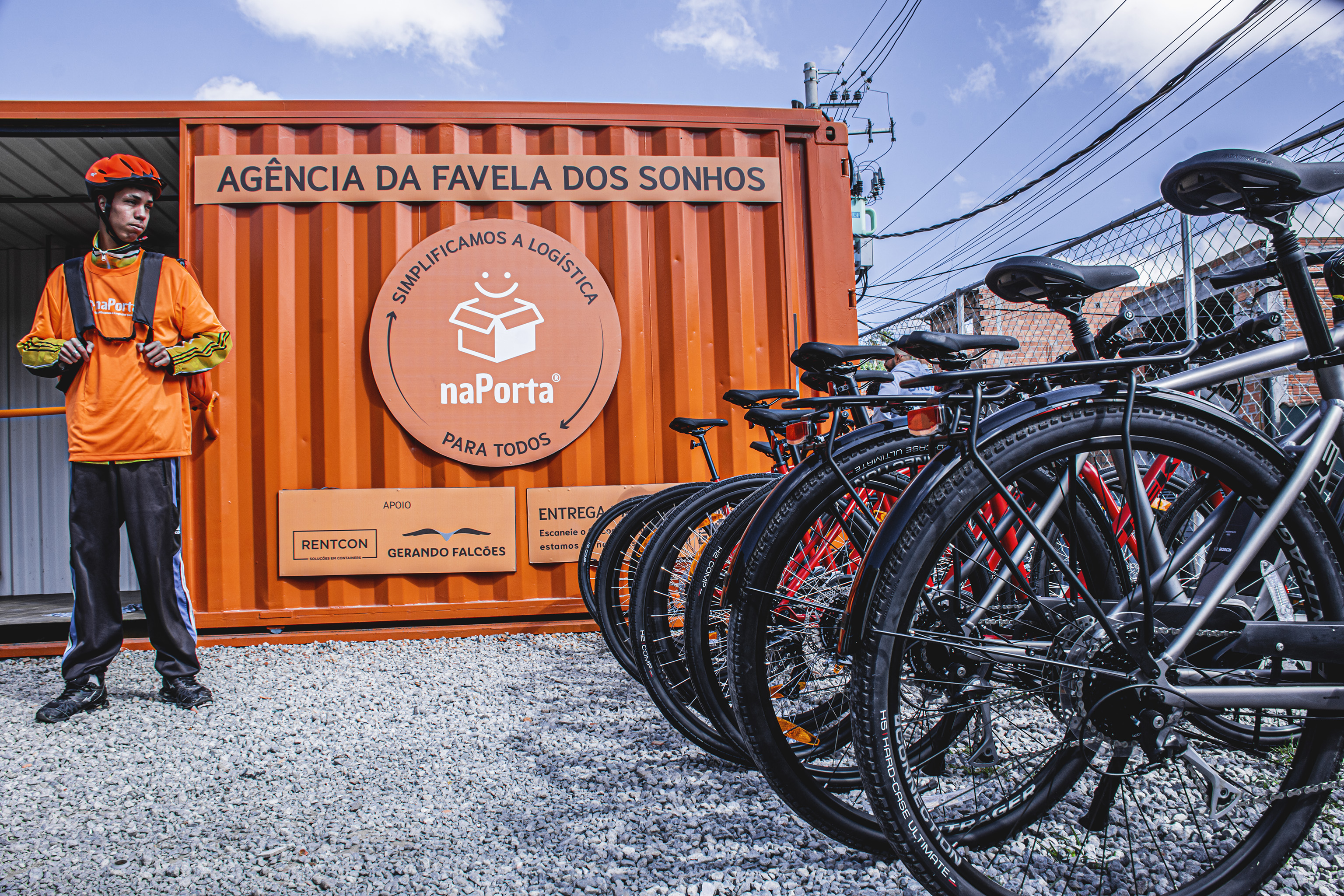 A naPorta courier prepares to make deliveries by bike