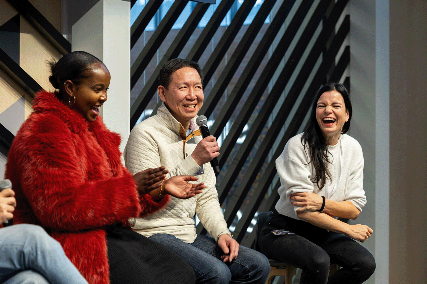 A person from the group is addressing the others with a mic.