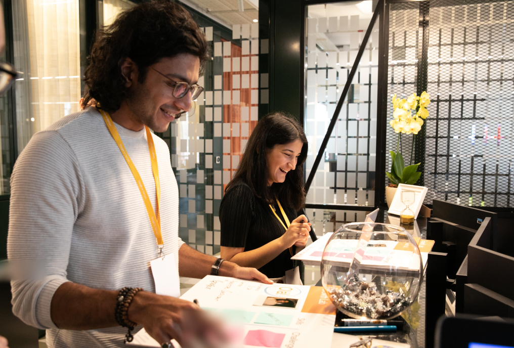 A man and a lady is checking a document.