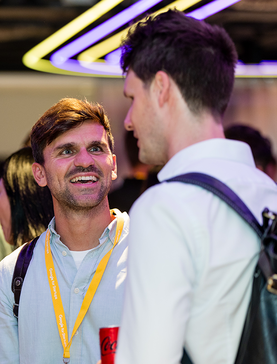 Two persons are engaged in the conversation